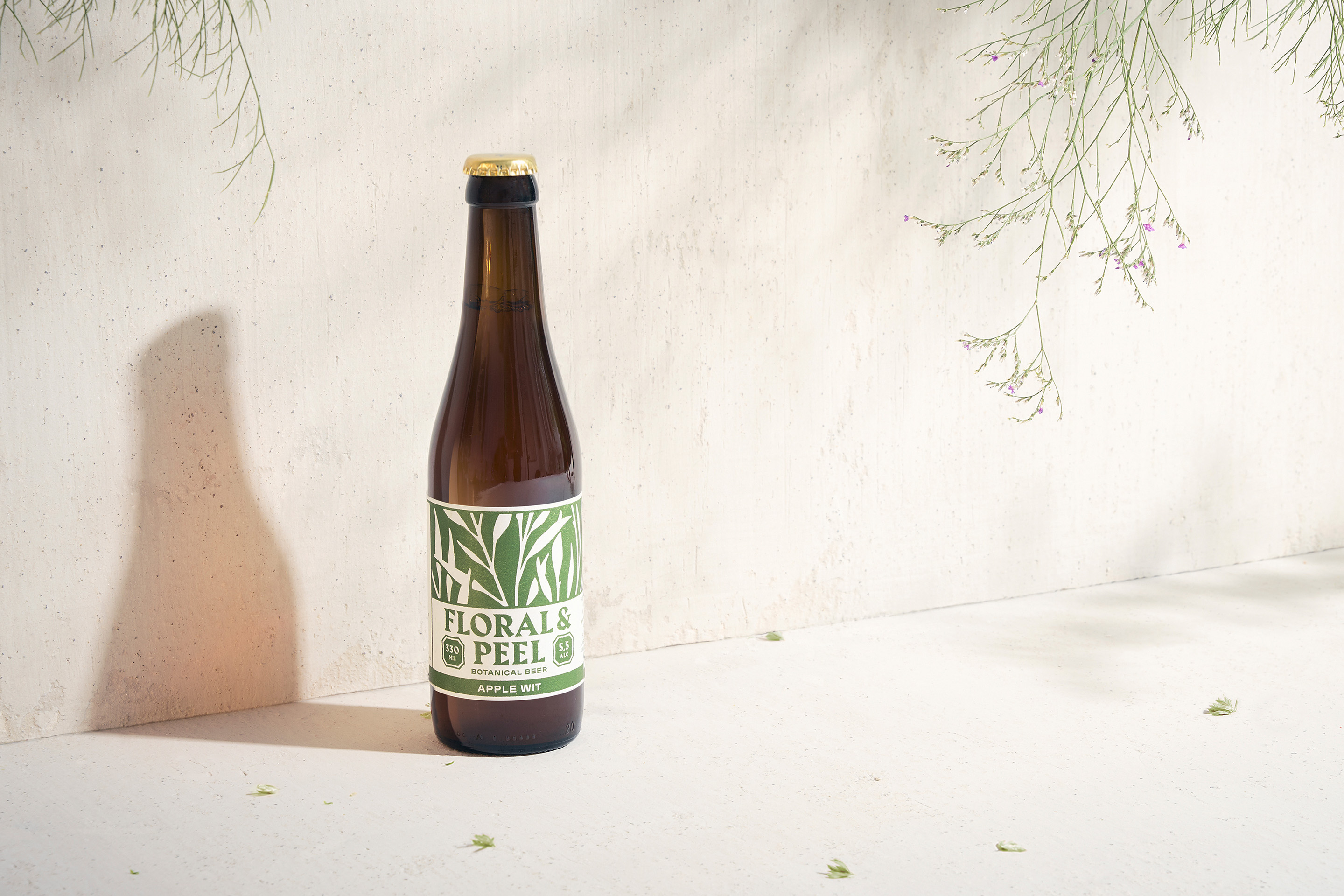 Neumeister packaging design Floral & Peel Apple Wit beer bottle